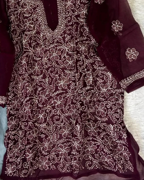Close-up of hand-embroidered Lucknowi Chikankari work on georgette